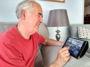 Carer using video conference technology